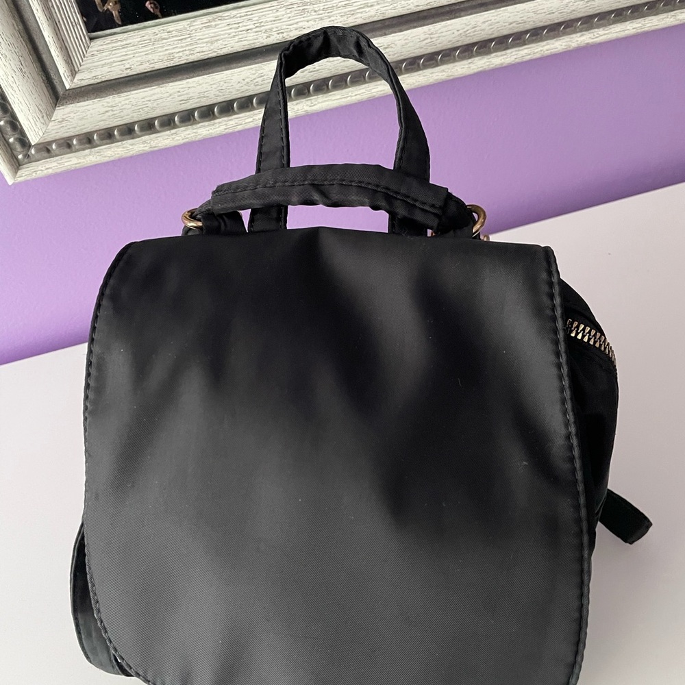 Medium size backpack with cheetah print lining - Picture 7 of 9